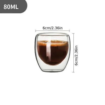 Double-walled glass with coffee measurement details on a white background