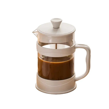 French press with coffee on a white background