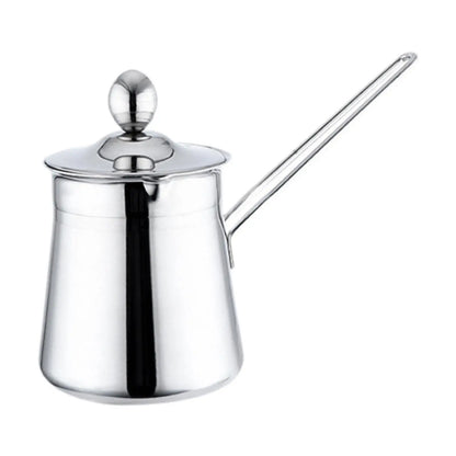 Stainless steel Turkish coffee maker with a long handle on a white background